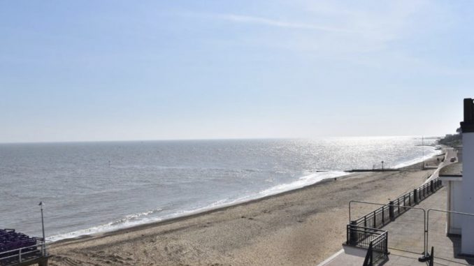 Clacton's beach completely empty, along with the seafront and pier looking completely deserted